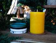 Wide pillar candle and pottery saucer bundle