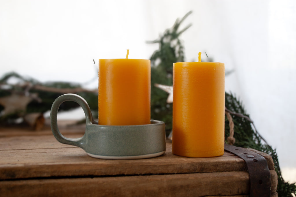 Pottery pillar candle holder