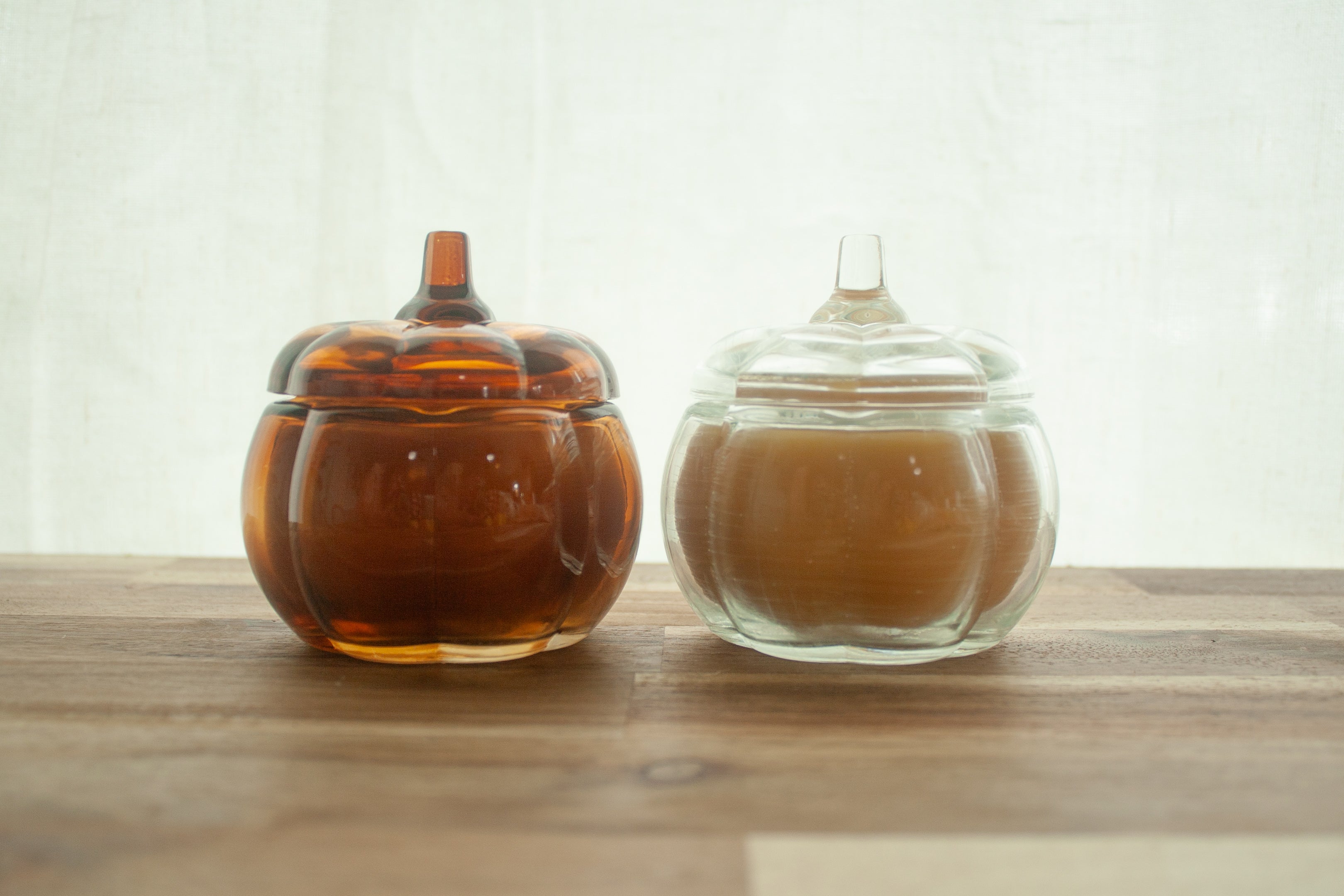 Glass pumpkin candle
