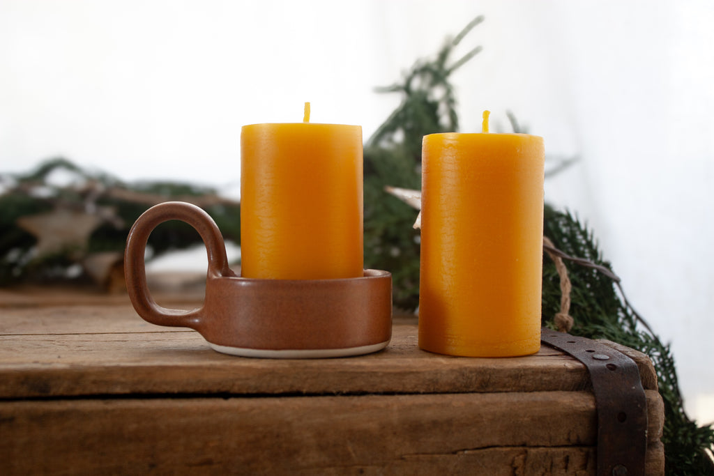 Pottery pillar candle holder